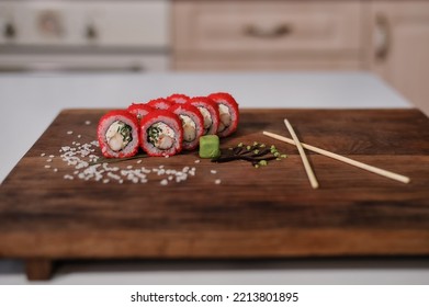 Sushi Roll With Salmon, Avocado, Cucumber And Red Caviar.