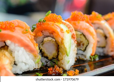 Sushi roll with salmon and shrimp tempura - Powered by Shutterstock