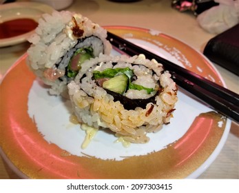 Sushi Roll With Tuna, Light Spicy Mayo Sauce And Vegetables