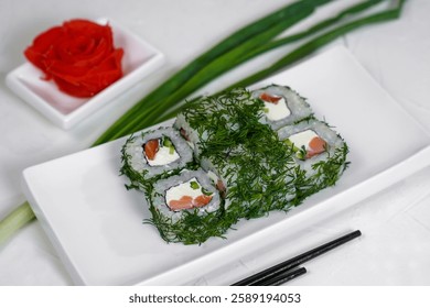 sushi rolls green caviar dill soy sauce wasabi ginger
