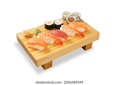 Sushi Rolls on bamboo board isolated on White background - Powered by Shutterstock