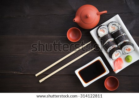 Similar – Image, Stock Photo Delicious sushi rolls on board with chopsticks