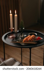 Sushi Rolls With Salmon On Table With Candles And Soy Sauce, Celebration Mood, No People, Restaurant Background