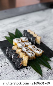 Sushi Set Nigiri And Sushi Rolls On Black Stone Plate Board. Place For Tex. Instagram Stories