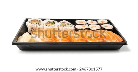 Sushi Set in Plastic Container, Take Away Salmon Susi Rolls Lunch Box, Nori Maki, Nigiri Sushi Roll Isolated on White Background