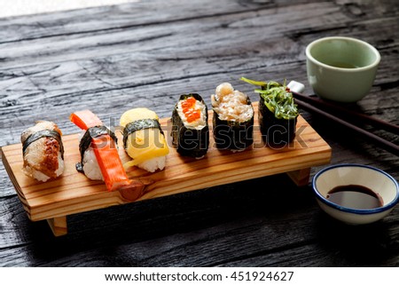 Sushi Set served on dark wooden table