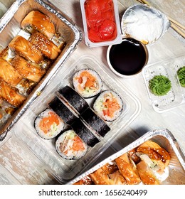 Sushi For Takeout Or Delivery Sushi. The Concept Of Food Delivery.