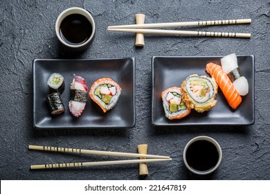 Sushi for two served on black stone - Powered by Shutterstock