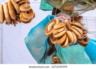 Sushki, traditional Russian, also Ukrainian and Lithuanian, Eastern European small, crunchy, mildly sweet bread rings eaten for dessert, usually with tea or coffee in a street food regional market