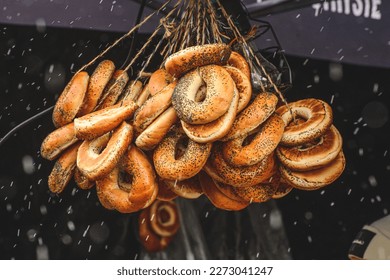 Sushki, traditional Russian, also Ukrainian and Lithuanian, Eastern European small, crunchy, mildly sweet bread rings with poppy seeds in a street food regional market