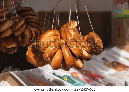 Sushki, traditional Russian, also Ukrainian and Lithuanian, Eastern European small, crunchy, mildly sweet bread rings eaten for dessert, usually with tea or coffee in a street food regional market