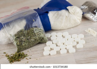 a suspected drug trafficking - cocaine, heroin, spice, marijuana, and etc - many unknown pills, white powder in a transparent package and the foil and similar to the "spice" mixture