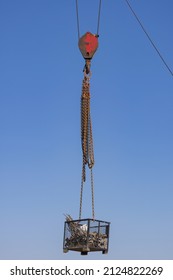 Suspended In Air Crane Hoist Basket With Tools And Material