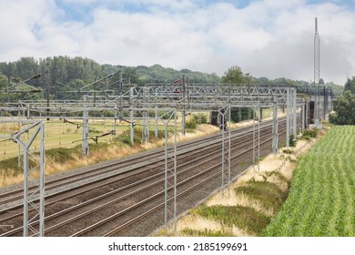 Suspended Overhead Electric Power Train Lines Cables Over A Railroad Track