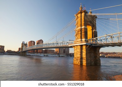 Suspension Bridge In Cincinnati Ohio At Sunrise.