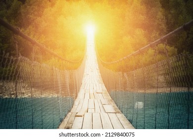 Suspension bridge in the forest (concept way to the unknown) - Powered by Shutterstock