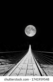 Suspension Bridge with a full moon