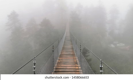 Suspension bridge in mountain, Fog Oaxaca Mexico  - Powered by Shutterstock