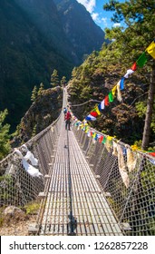 Suspension Bridge On The Way To Namche Bazar In Himalayas. Everest Base Camp Trek In Nepal. Hillary Bridge