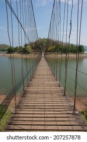 Suspension bridge that leads to the other side of the river.