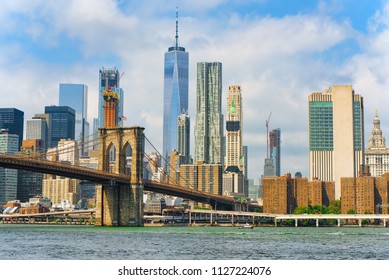 Suspension Brooklyn Bridge across the East River between the Lower Manhattan and Brooklyn. New York, USA. - Shutterstock ID 1127224076
