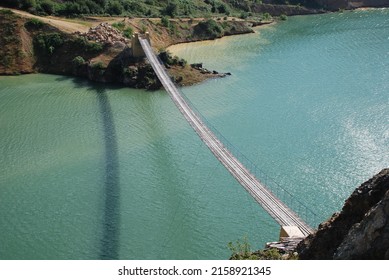 Suspension Wooden Bridge Connecting The Two Sides