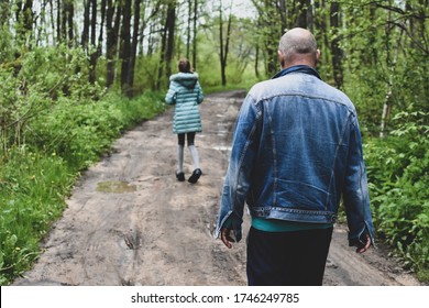 A Suspicious Man Is Following The Crime Girl In The Forest. Abduction Of Children. Trafficking In Persons Spying On Children. Harassment And Assault.