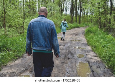 A Suspicious Man Is Following The Crime Girl In The Forest. Abduction Of Children. Trafficking In Persons Spying On Children. Harassment And Assault.