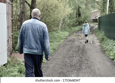 A Suspicious Man Is Following The Crime Girl In The Forest. Abduction Of Children. Trafficking In Persons Spying On Children. Harassment And Assault.