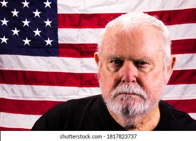 Suspicious Old Vietnam Vet In Front Of American Flag