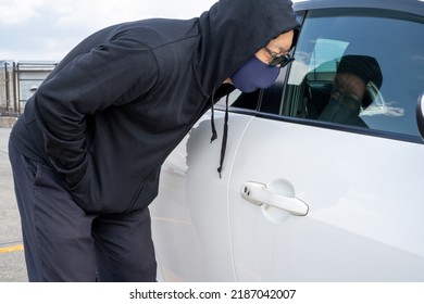 Suspicious Person Looking Into The Car.