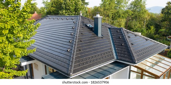 Sustainable Development: Solar Roof Tiles On The House. 