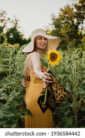 Sustainable Fashion, Organic Clothes, Eco Clothing, Ecology, Sustainability, Responsible Fashion, Organic Cotton. Young Woman In Clothes Made Of Natural Fabric With Flowers On Nature Background.