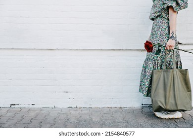 Sustainable Lifestyle, Zero Waste, Plastic Free. Mockup, Web Banner With Faceless Portrait Of Woman Holding Cotton Grocery Bag And Red Rose On White Wall Background