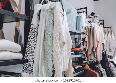 Sustainable Living, Zero Waste Wardrobe. Secondhand Fashion. Various Clothes On Hangers On Shelves At Local Market, Shop, Store.