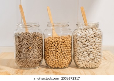 Sustainable Pantry Organization With Glass Jars Holding Lentils, Chickpeas, And Beans. Sustainable Storage Of Bulk Organic Foods - Powered by Shutterstock