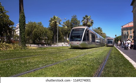Sustainable Public Transport Moving On Green Grass Tracks, Urban Infrastructure