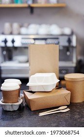 Sustainable Recyclable Takeaway Food Packaging On Counter In Coffee Shop