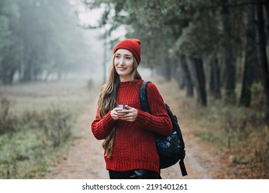 Sustainable Tourism, Responsible Travel. Young Woman Traveler With Backpack Holding Tremors Zero Waste Cup