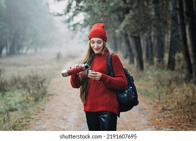 Sustainable Tourism, Responsible Travel. Young Woman Traveler With Backpack Holding Tremors Zero Waste Cup