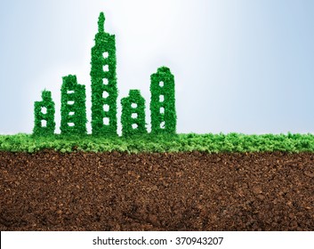 Sustainable Urban Development Concept With Grass Growing In Shape Of A City 