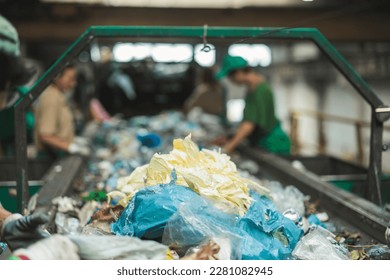 Sustainable Waste Management: Sorting Plastic Waste at Recycling Centers for Environmental Preservation and Resource Recovery - Powered by Shutterstock - Get 15% off with code: PIKWIZARD15