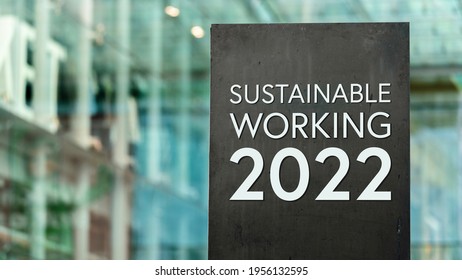 Sustainable Working 2022 Sign In Front Of A Modern Office Building