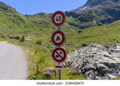 Susten Pass with mountain panorama and traffic signs at private mountain road on a sunny summer day. Photo taken July 13th, 2022, Susten Pass, Switzerland. - Shutterstock ID 2184428473