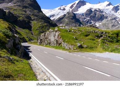 Susten Pass with mountain pass road and mountain panorama in the background on a sunny summer day. Photo taken July 13th, 2022, Susten Pass, Switzerland. - Shutterstock ID 2186991197