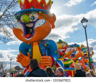 Susteren, Limburg/ The Netherlands - March 5 2019: Sun Rays Behind The Colorful Head Of One Of The Participating Cars During The Limburg Carnaval Car Championship.