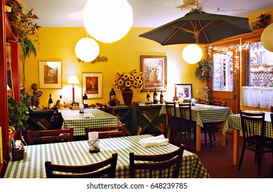 SUTTER CREEK, CALIFORNIA, USA - October 8, 2009: Interior Area Of A Restaurant Casual Restaurant With Wine Bottles Lining The Walls