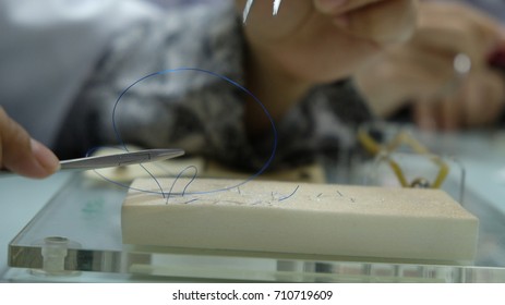 Suture, Needle Holder And Suturing Board Used For Surgical Trainee During Basic Surgical Workshop.