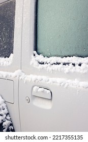 SUV Car Door Covered In Snow In Winter, UK