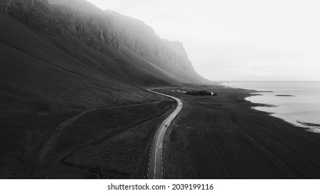 SUV car driving in the countryside drone shot grayscale - Powered by Shutterstock